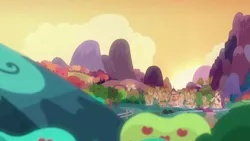Size: 1280x720 | Tagged: safe, derpibooru import, screencap, the perfect pear, apple, apple tree, background, cloud, food, hill, image, mountain, no pony, png, ponyville, scenic ponyville, sunset, tree, windmill