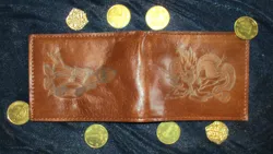 Size: 1024x577 | Tagged: safe, alternate version, artist:malte279, derpibooru import, princess celestia, gryphon, coin, craft, fantasy class, image, jpeg, leather, pyrography, traditional art, wallet, warrior