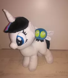 Size: 1080x1243 | Tagged: safe, artist:rxndxm.artist, derpibooru import, oc, unofficial characters only, parasprite, pony, unicorn, duo, eyelashes, horn, image, irl, jpeg, photo, plushie, riding, unicorn oc