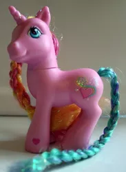 Size: 533x728 | Tagged: safe, derpibooru import, photographer:lilcricketnoise, rarity (g3), pony, unicorn, braid, braided tail, female, g3, image, jpeg, mare, photo, smiling, solo, toy