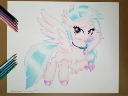 Size: 4032x3024 | Tagged: safe, artist:maximustimaeus, derpibooru import, silverstream, hippogriff, bedroom eyes, claws, colored pencil drawing, colored pencils, cute, diastreamies, female, flying, hooves, image, jewelry, jpeg, simple background, smiling, solo, traditional art, white background, wings