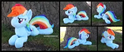 Size: 4118x1754 | Tagged: safe, artist:peruserofpieces, derpibooru import, rainbow dash, pegasus, pony, beanie (plushie), determined, female, image, irl, lying down, mare, photo, plushie, png, prone, smiling, sploot, tree, wings