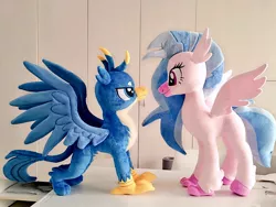 Size: 1024x768 | Tagged: safe, artist:nekokevin, derpibooru import, gallus, silverstream, classical hippogriff, gryphon, hippogriff, duo, female, image, irl, jpeg, lidded eyes, looking at each other, male, photo, plushie, size difference, smiling, spread wings, wings