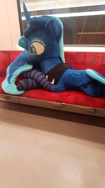 Size: 1072x1920 | Tagged: safe, derpibooru import, princess luna, alicorn, pony, clothes, female, giant pony, image, irl, jpeg, lying down, macro, mare, mega luna, metro, photo, plushie, poland, prone, socks, solo, striped socks, subway train, train, underground, warsaw