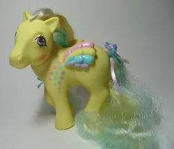 Size: 779x669 | Tagged: safe, derpibooru import, photographer:pinkrosedust, ringlet (g1 rainbow curl), bow, g1, image, jpeg, rainbow curl pony, tail bow, toy