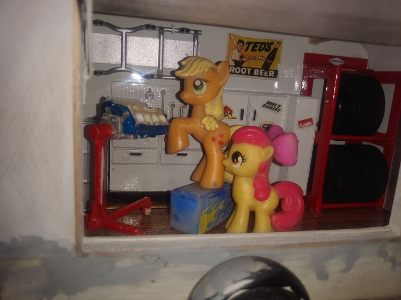 Size: 4160x3120 | Tagged: safe, derpibooru import, apple bloom, applejack, blind bag, creeper, engine, engine stand, everfree customs, image, irl, jpeg, photo, tires, tools, toy, trailer, workbench