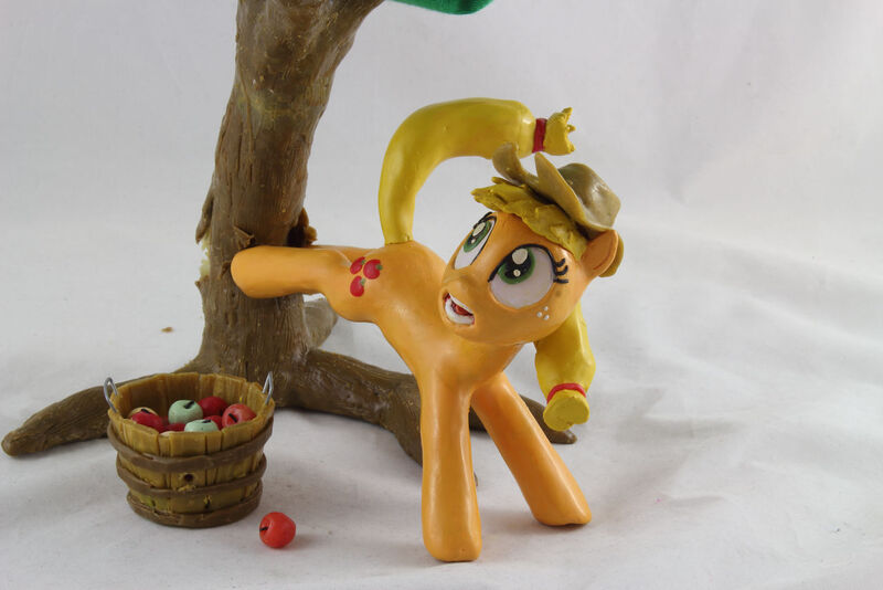 Size: 1280x854 | Tagged: safe, artist:azgchip, derpibooru import, applejack, earth pony, pony, accident, apple, apple tree, applebucking, bucket, bucking, craft, faic, falling, female, food, freckles, image, jpeg, mare, photo, scared, sculpture, shocked, solo, tree, wax, wide eyes