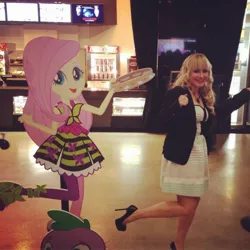 Size: 720x720 | Tagged: safe, derpibooru import, fluttershy, spike, dog, human, equestria girls, rainbow rocks, andrea libman, andrea libman with cardboard, cardboard cutout, female, image, instagram, irl, irl human, jpeg, male, musical instrument, open mouth, photo, spike the dog, standing, standing on one leg, tambourine, voice actor