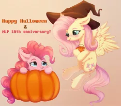 Size: 1778x1558 | Tagged: safe, artist:astralblues, derpibooru import, fluttershy, pinkie pie, earth pony, pegasus, pony, chest fluff, cute, ear fluff, fangs, female, fluffy, flutterpie, flying, hair, halloween, happy birthday mlp:fim, hat, holiday, image, jpeg, leg fluff, lesbian, looking up, mane, mlp fim's tenth anniversary, pumpkin, shipping, shy, tail, teeth