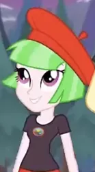 Size: 192x345 | Tagged: safe, derpibooru import, screencap, watermelody, equestria girls, legend of everfree, background human, beret, camp everfree logo, camp everfree outfits, clothes, cropped, female, hat, image, jpeg, looking up, shirt, solo, t-shirt