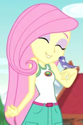 Size: 442x662 | Tagged: safe, derpibooru import, screencap, fluttershy, bird, equestria girls, legend of everfree, legend of everfree - bloopers, clothes, cropped, female, image, png, sleeveless, smiling, tanktop