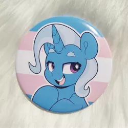 Size: 3120x3120 | Tagged: safe, artist:partylikeanartist, derpibooru import, trixie, pony, unicorn, button, etsy, image, jpeg, merchandise, photo, pin, pride, pride flag, simple background, solo, trans trixie, transgender, transgender pride flag