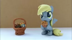 Size: 1280x720 | Tagged: safe, artist:sparkle257, derpibooru import, derpy hooves, pegasus, pony, basket, figurine, food, image, jpeg, muffin, solo