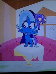 Size: 3024x4032 | Tagged: safe, derpibooru import, screencap, trixie, pony, unicorn, friendship gems, my little pony: pony life, spoiler:pony life s01e12, bipedal, cape, clothes, hat, image, jpeg, photo, picture of a screen, t pose, trixie's cape, trixie's hat