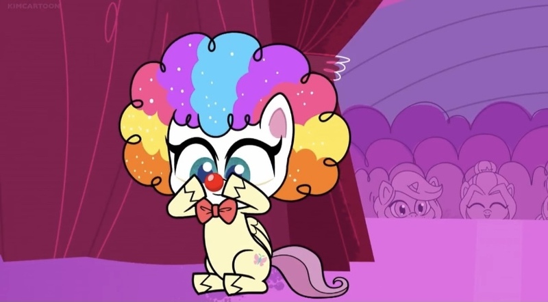 Size: 828x457 | Tagged: safe, derpibooru import, screencap, fluttershy, pegasus, my little pony: pony life, spoiler:pony life, spoiler:pony life s02e19, backstage, clown makeup, clown nose, clown wig, crowd, curtains, cute, flutterclown, image, jpeg, lolly-pop, shyabetes