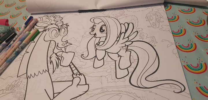 Size: 720x345 | Tagged: safe, derpibooru import, discord, fluttershy, draconequus, pegasus, pony, coloring, coloring book, coloring page, female, image, irl, male, mare, photo, png, rainbow