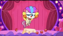 Size: 828x473 | Tagged: safe, derpibooru import, screencap, fluttershy, pegasus, my little pony: pony life, spoiler:pony life, spoiler:pony life s02e19, apple, bowtie, clown makeup, clown nose, clown wig, cute, flutterclown, food, image, jpeg, lolly-pop, rainbow wig, red nose, shyabetes, stage