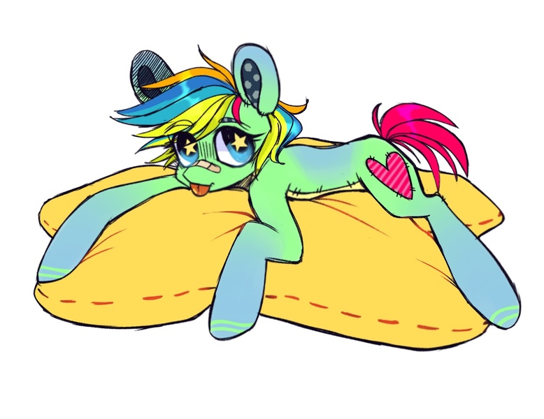 Size: 1240x956 | Tagged: safe, derpibooru import, oc, oc:mia (malarunych), unofficial characters only, original species, plush pony, pony, bandage, cutie mark, female, image, jpeg, lying, mare, pillow, plushie, solo, tongue out