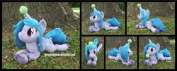 Size: 4335x1754 | Tagged: safe, artist:peruserofpieces, derpibooru import, izzy moonbow, pony, unicorn, ball, beanie, cute, female, g5, hat, high res, image, irl, izzy's tennis ball, izzybetes, looking at you, lying down, mare, mouth hold, photo, plushie, png, prone, smiling, smiling at you, solo, sploot, tennis ball, tree