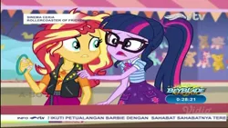 Size: 1080x607 | Tagged: safe, derpibooru import, screencap, sci-twi, sunset shimmer, twilight sparkle, equestria girls, equestria girls series, rollercoaster of friendship, bowtie, clothes, cutie mark, cutie mark on clothes, female, geode of empathy, geode of telekinesis, image, indonesia, jacket, jewelry, jpeg, leather, leather jacket, magical geodes, necklace, open mouth, ponytail, rajawali televisi, rtv, wrong aspect ratio