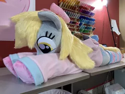Size: 2688x2016 | Tagged: safe, artist:qtpony, derpibooru import, derpy hooves, pony, clothes, image, irl, jpeg, lying down, photo, plushie, prone, shirt, solo