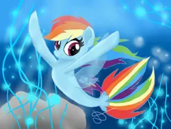 Size: 960x720 | Tagged: safe, artist:lightstar2001, derpibooru import, rainbow dash, pegasus, pony, seapony (g4), bioluminescent, crepuscular rays, deviantart watermark, eyelashes, female, fish tail, flowing tail, image, jpeg, multicolored hair, obtrusive watermark, ocean, pink eyes, rock, seaponified, seapony rainbow dash, seaweed, signature, smiling, solo, species swap, swimming, tail, underwater, water, watermark