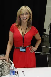 Size: 3456x5184 | Tagged: safe, derpibooru import, human, bronycon, bronycon 2012, 2012, hand on hip, image, irl, irl human, jpeg, photo, smiling, tara strong, voice actor, water bottle