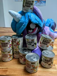 Size: 3024x4032 | Tagged: safe, derpibooru import, izzy moonbow, g5, my little pony: a new generation, beans, canned beans, canned food, cans, food, gekoloniseerd, image, irl, jpeg, photo, plushie, poster, that pony sure does love beans