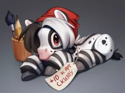 Size: 985x733 | Tagged: safe, artist:zazush-una, derpibooru import, oc, oc:kabachok, earth pony, pony, beanie, cape, clothes, cup, hat, image, jpeg, leg warmers, lying down, male, paintbrush, pencil, plushie, prone, solo, stallion