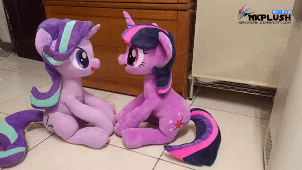 Size: 600x338 | Tagged: safe, artist:nekokevin, derpibooru import, starlight glimmer, twilight sparkle, pony, unicorn, series:nekokevin's glimmy, animated, boop, cute, duo, female, gif, glimmerbetes, happy, image, irl, looking at each other, mare, open mouth, photo, plushie, raised hoof, sitting, smiling, starlight glimmer plushie, stop motion, twiabetes, underhoof, unicorn twilight, watermark