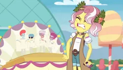 Size: 1252x717 | Tagged: safe, derpibooru import, screencap, vignette valencia, equestria girls, equestria girls series, rollercoaster of friendship, angry, female, flower, flower in hair, image, jpeg, mobile phone, phone, teeth