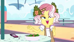 Size: 1266x719 | Tagged: safe, derpibooru import, screencap, vignette valencia, equestria girls, equestria girls series, rollercoaster of friendship, female, flower, flower in hair, food, fork, image, jpeg, mobile phone, phone, salad, solo, solo female