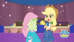 Size: 3410x1920 | Tagged: safe, derpibooru import, screencap, applejack, fluttershy, best in show: the pre-show, equestria girls, equestria girls series, spoiler:eqg series (season 2), applejack's hat, belt, best in show logo, clothes, cowboy hat, cute, cutie mark, cutie mark on clothes, denim skirt, female, geode of super strength, hat, image, jackabetes, jewelry, jpeg, magical geodes, microphone, necklace, open mouth, skirt