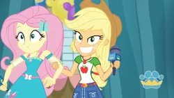 Size: 3410x1920 | Tagged: safe, derpibooru import, screencap, applejack, fluttershy, best in show: the pre-show, equestria girls, equestria girls series, spoiler:eqg series (season 2), applejack's hat, belt, best in show logo, clothes, cowboy hat, cute, cutie mark, cutie mark on clothes, denim skirt, female, geode of fauna, geode of super strength, grin, hairpin, hat, image, jewelry, jpeg, magical geodes, microphone, necklace, shyabetes, skirt, smiling