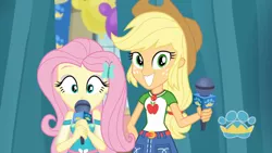 Size: 3410x1920 | Tagged: safe, derpibooru import, screencap, applejack, fluttershy, best in show: the pre-show, equestria girls, equestria girls series, spoiler:eqg series (season 2), applejack's hat, belt, best in show logo, clothes, cowboy hat, cute, cutie mark, cutie mark on clothes, denim skirt, female, geode of super strength, grin, hairpin, hat, image, jackabetes, jewelry, jpeg, magical geodes, microphone, necklace, shyabetes, skirt, smiling