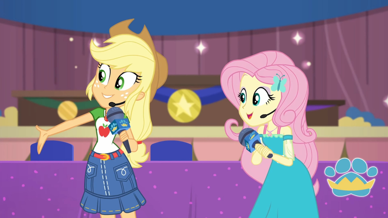 Size: 3410x1920 | Tagged: safe, derpibooru import, screencap, applejack, fluttershy, best in show: the victory lap, equestria girls, equestria girls series, spoiler:eqg series (season 2), applejack's hat, belt, best in show logo, clothes, cowboy hat, cutie mark, cutie mark on clothes, denim skirt, female, geode of fauna, geode of super strength, hairpin, hand on hip, hat, image, jewelry, jpeg, magical geodes, microphone, necklace, open mouth, skirt, smiling