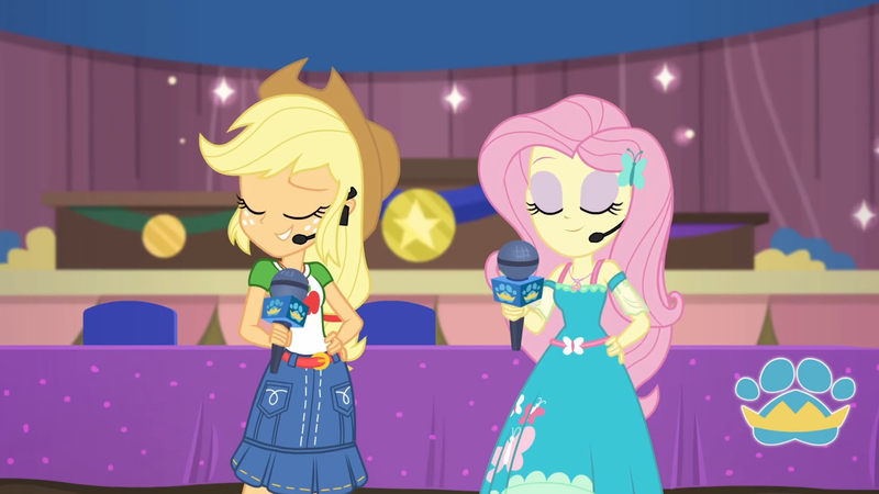 Size: 3410x1920 | Tagged: safe, derpibooru import, screencap, applejack, fluttershy, best in show: the victory lap, equestria girls, equestria girls series, spoiler:eqg series (season 2), applejack's hat, belt, best in show logo, clothes, cowboy hat, cutie mark, cutie mark on clothes, denim skirt, eyes closed, female, geode of fauna, geode of super strength, hairpin, hand on hip, hat, image, jewelry, jpeg, magical geodes, microphone, necklace, skirt, smiling