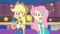 Size: 3410x1920 | Tagged: safe, derpibooru import, screencap, applejack, fluttershy, best in show: the victory lap, equestria girls, equestria girls series, spoiler:eqg series (season 2), applejack's hat, belt, best in show logo, clothes, cowboy hat, cutie mark, cutie mark on clothes, denim skirt, female, geode of fauna, geode of super strength, hairpin, hat, image, jewelry, jpeg, magical geodes, microphone, necklace, skirt, smiling
