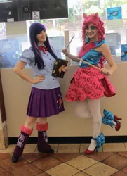 Size: 761x1050 | Tagged: safe, artist:sarahndipity cosplay, artist:shelbeanie, derpibooru import, pinkie pie, twilight sparkle, human, equestria girls, rainbow rocks, 2014, book, book of harmony, clothes, cosplay, costume, drumsticks, hand on hip, image, irl, irl human, jpeg, photo