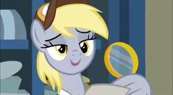 Size: 780x432 | Tagged: safe, derpibooru import, screencap, derpy hooves, pegasus, pony, best gift ever, cute, derpabetes, female, image, jpeg, lidded eyes, magnifying glass, mailmare, mare, post office, postman's hat, solo, wing hands, wing hold, wings