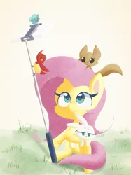 Size: 1666x2224 | Tagged: safe, artist:pitybug, derpibooru import, angel bunny, fluttershy, bird, butterfly, insect, pegasus, pony, rabbit, squirrel, my little pony: pony life, animal, duo, female, folded wings, grass, hoof hold, image, looking at something, looking up, mare, outdoors, phone, png, selfie, selfie stick, sitting, smiling, unshorn fetlocks, wings