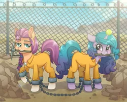 Size: 989x800 | Tagged: safe, artist:toxiccolour, derpibooru import, izzy moonbow, sunny starscout, earth pony, pony, unicorn, ankle chain, ankle cuffs, ball, bound together, chains, clothes, commission, cuffs, duo, female, fence, g5, hornball, image, izzy's tennis ball, jumpsuit, magic suppression, mare, markings, mouth hold, pickaxe, png, prison, prison outfit, prisoner, raised hoof, rock, tennis ball