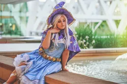 Size: 2048x1365 | Tagged: safe, artist:mieucosplay, artist:xen photography, derpibooru import, trixie, human, bronycon, bronycon 2016, cape, clothes, cosplay, costume, hat, image, irl, irl human, jpeg, photo, sitting, trixie's cape, trixie's hat