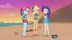 Size: 3410x1920 | Tagged: safe, derpibooru import, screencap, applejack, rainbow dash, rarity, equestria girls, equestria girls series, lost and found, applejack's hat, beach, belly button, cap, clothes, cowboy hat, female, geode of shielding, geode of super speed, geode of super strength, hairpin, hand on hip, hat, headphones, high res, image, jewelry, jpeg, magical geodes, midriff, necklace, sandals, smiling, swimsuit