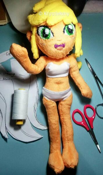 Size: 613x1040 | Tagged: questionable, artist:krystlekmy, derpibooru import, applejack, human, equestria girls, bra, clothes, image, jpeg, panties, plushie, scissors, underwear, wip