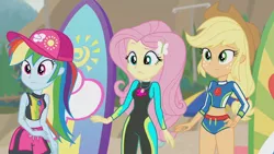 Size: 3410x1920 | Tagged: safe, derpibooru import, screencap, applejack, fluttershy, rainbow dash, blue crushed, equestria girls, equestria girls series, applejack's hat, beach, belly button, cap, clothes, cowboy hat, female, geode of fauna, geode of super speed, geode of super strength, hairpin, hat, high res, image, jewelry, jpeg, magical geodes, necklace, smiling, surfboard, swimsuit