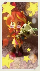 Size: 540x960 | Tagged: safe, derpibooru import, discord, sunset shimmer, equestria girls, black sclera, boots, chibi, clothes, doll, dress, equestria girls minis, eqventures of the minis, image, irl, irl photo, jacket, jpeg, leather jacket, photo, shoes, stars, swirls, toy