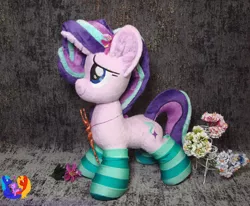 Size: 2802x2304 | Tagged: safe, artist:1stastrastudio, derpibooru import, starlight glimmer, pony, unicorn, clothes, flower, high res, image, irl, jewelry, jpeg, pendant, photo, plushie, smiling, socks, solo, staff, staff of sameness, striped socks