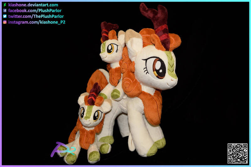 Size: 1095x730 | Tagged: safe, artist:kiashone, derpibooru import, autumn blaze, kirin, autumn plenty, black background, image, jpeg, multeity, plushie, simple background, text