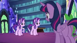 Size: 1920x1079 | Tagged: safe, derpibooru import, screencap, spike, starlight glimmer, twilight sparkle, twilight sparkle (alicorn), alicorn, every little thing she does, image, library, png, similo duplexis, twilight's castle, twilight's castle library